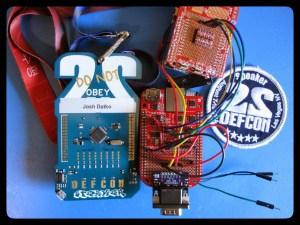 CHUCKWAGON hardware implant consisting of BeagleBone Black, CryptoCape, GSM Shield, and CHUCKWAGON Adapter. Shown here with DC22 Speaker badge and patch.